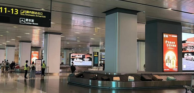 天津機場T2到達行李廳燈箱廣告投放，天津濱海機場廣告價格